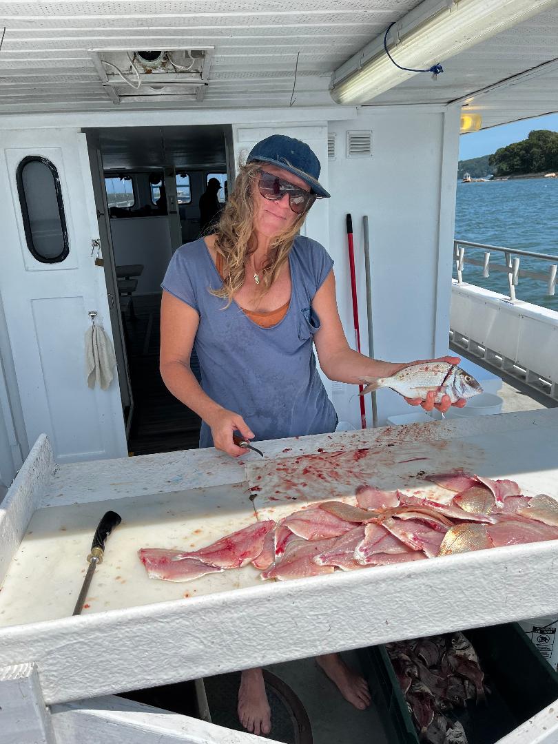 Mate cleaning fish.jpg