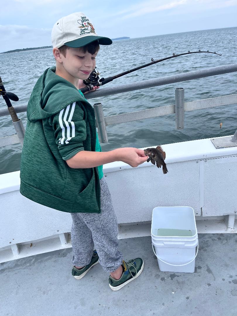 Ted with small sea bass.jpg